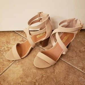 Light tan sandals. Size 8. Never wor